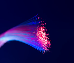 optical fibres dinamic flying from deep on technology background