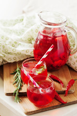 Ice refreshing summer drink with strawberry and chili