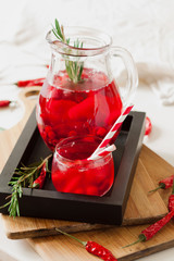 Ice refreshing summer drink with strawberry and chili