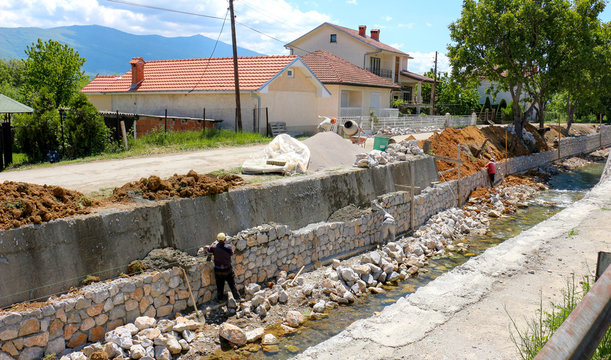  constructing river embankment