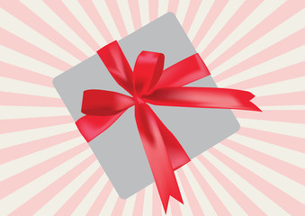 gray gift box with shiny red ribbon bow