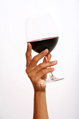 main tenant un verre de vin