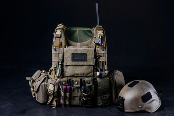 Body armor covers, bulletproof vest/Bulletproof vest,helmet and other military equipment on black background