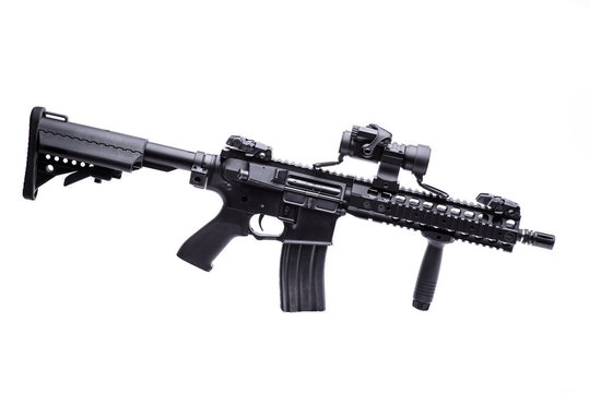 US specops rifle isolated/ Modern US specops rifle with optic scope isolated on white background