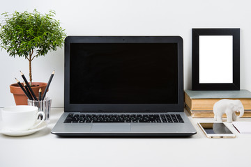 modern work space with laptop mockup on a table