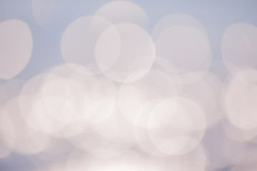 Soft colored abstract background with festive defocused lights .