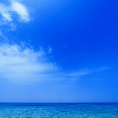 Naklejka na ściany i meble Blue sea and blue sky background / Abstract blue water sea wallp