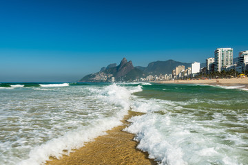 Fototapeta premium Low Waves on the Sand of Ipanema Beach in Rio de Janeiro