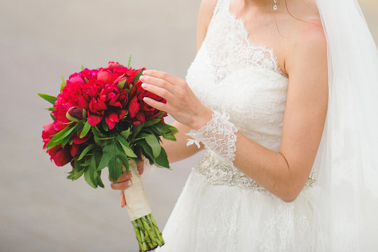 Bride Touching Bouquet