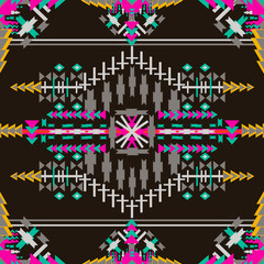 Colorful  aztec seamless pattern on dark background. Ethnic abstract geometric texture. Hand drawn navajo fabric. Can be used for wallpaper, web page background, fabric, paper, postcards.