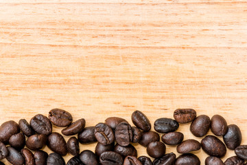 Roasted Coffee Beans background texture on wood background