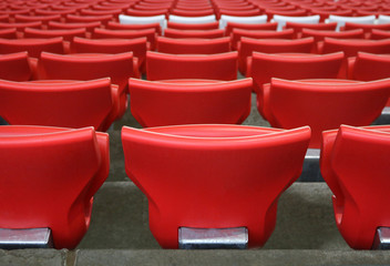 Naklejka premium red plastic chairs at the stadium