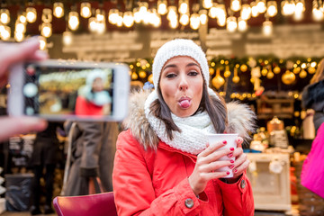 Young woman on the christmas market