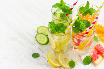 Summer drinks water with ice, mint and citrus, copy space