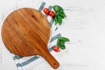 Cutting board for pizza. Traditional italian pizza board. Pizza top view. Great composition for...