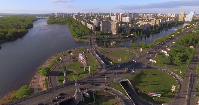 Aerial view on The Dnieper River and the Rusanivs'kyi Kanal. Kyiv, Ukraine. Car traffic on viaduct.