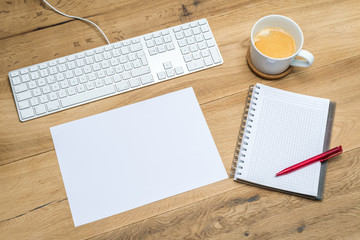 Workplace with supplies and blank space