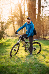 Fototapeta premium young man on a bicycle