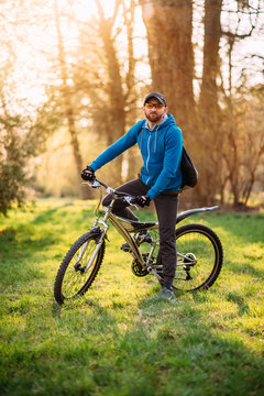 young man on a bicycle