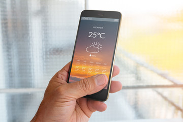 Smart phone with weather forecast - obrazy, fototapety, plakaty