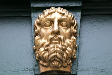 the bas-relief on the wall man face