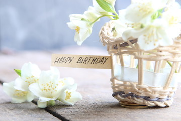 Fototapeta premium happy birthday text and flowers