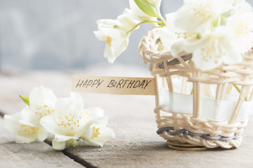 Obraz na płótnie Canvas happy birthday text and flowers