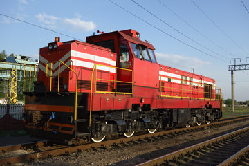 Naklejka premium powerful train on the rails