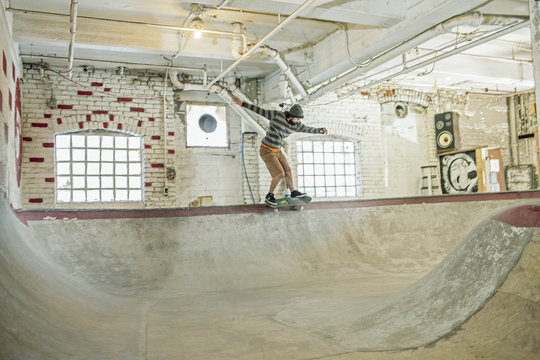 Young man skateboarding.