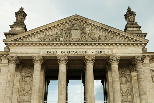 main entrance of the german parliament Bundestag with the dedication writing Dem deutschen Volke