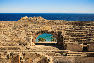 A view of the roman amphitheater in Tarragona, Spain. - obrazy, fototapety, plakaty
