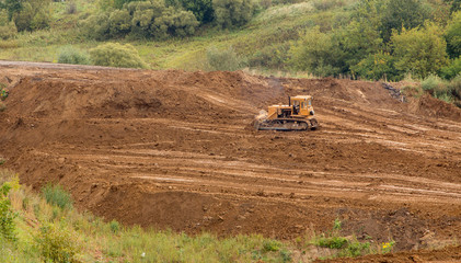 Yellow Construction bulldozer at Work