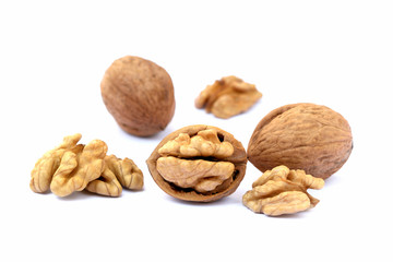 Pile of walnuts isolated on white background