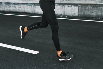 Sport. Close Up Of Sporty Male Legs In Sportwear And Sneakers Running On Road. Healthy Active...