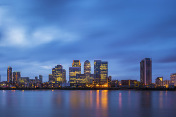 Fototapeta na wymiar London, UK - Canary Wharf, the famous business district and skyscrapers of London at blue hour