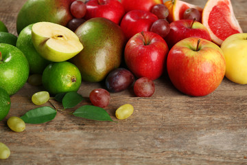 Naklejka na ściany i meble Fruits on wooden background