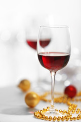 Wineglasses on light blurred background