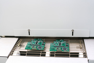 The conveyor brazing furnace. Factory for the production of chips. Technological process.
