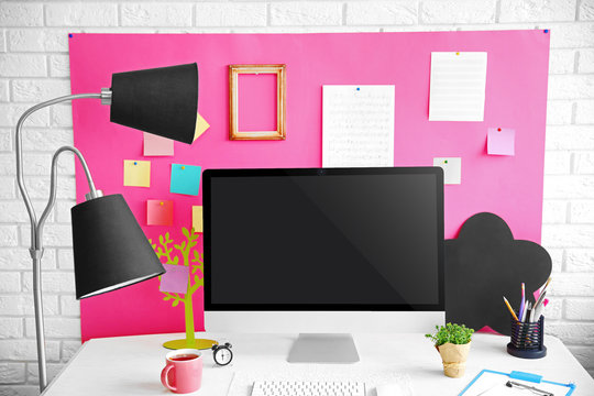 Stylish bright workplace of vivid person