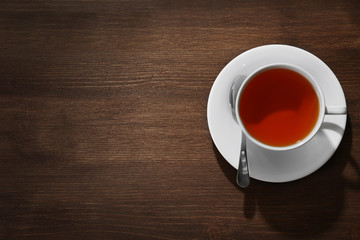 Cup of tea on wooden table