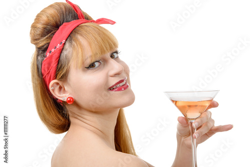 Retro beautiful pin up girl drink a glass of rose wine