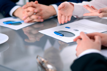 Group of business people at meeting  discussing financial results