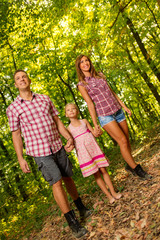 Fototapeta premium Family In The Forest