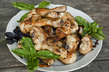Fried chicken legs with basil