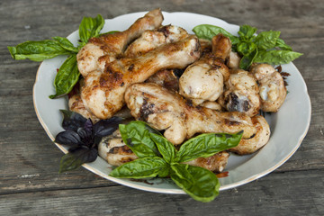 Fried chicken legs with basil