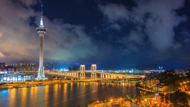 Macau Tower And Macau Bridge Landmark Place Of Macau China On Night Time (tilt up)