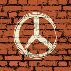 peace symbol on brick wall