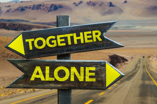 Together - Alone crossroad in a desert background