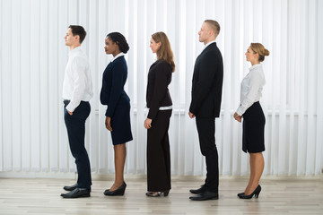 Businesspeople Standing In A Line