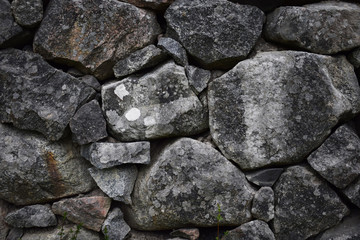 Beautiful grey stacked big rocks / stones (mineral wallpaper, background)